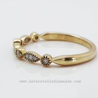 Fine wedding ring or stacker ring.10k yellow and natural diamonds. view 2