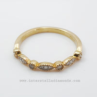 Fine wedding ring or stacker ring.10k yellow and natural diamonds. view 3