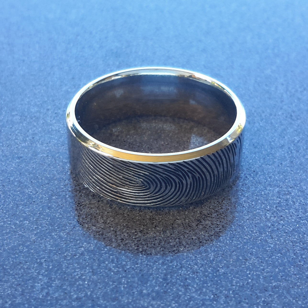 Men's wedding Ring with her Finger Print engraved on.